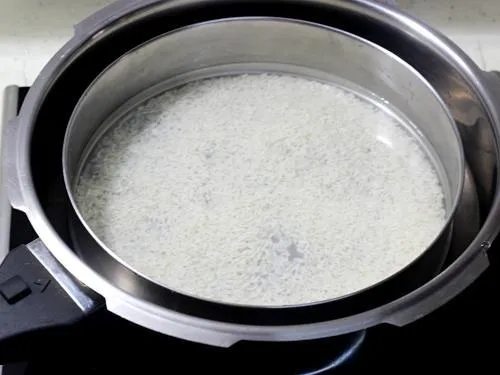 cook rice in pressure cooker for bisi bele bath recipe