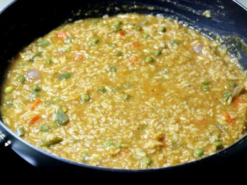 simmering rice dal in bisi bele bath masala