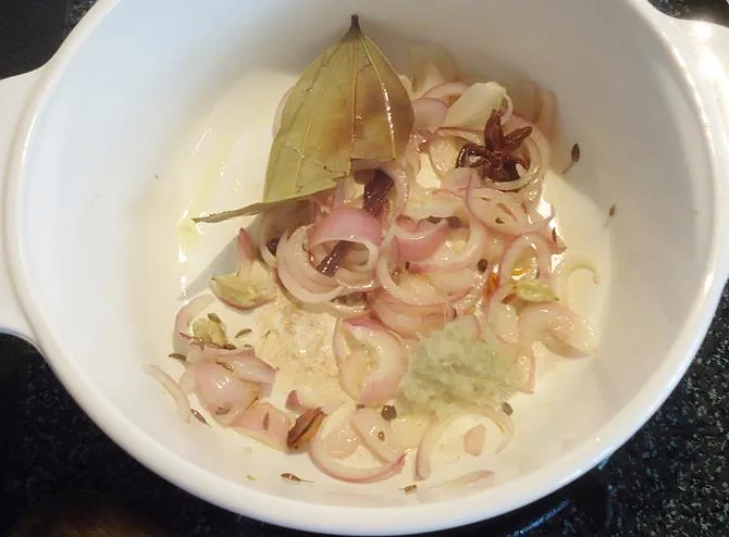 frying onions until golden for methi pulao recipe