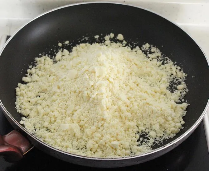 Grated khoya in a pan