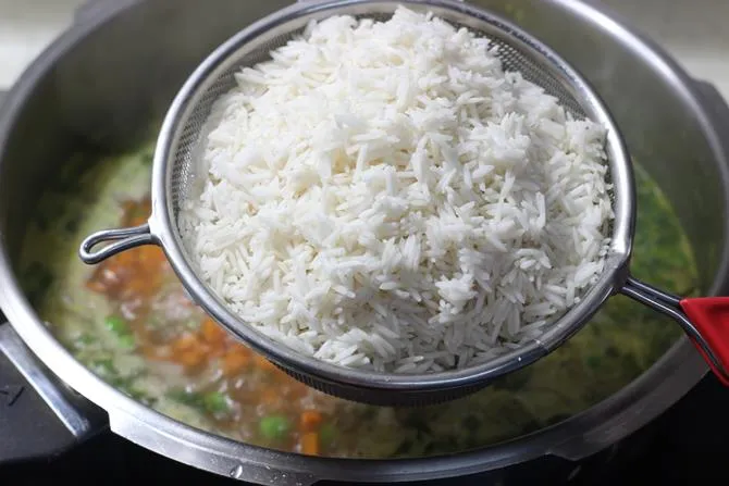addition of rice in paneer pulao recipe