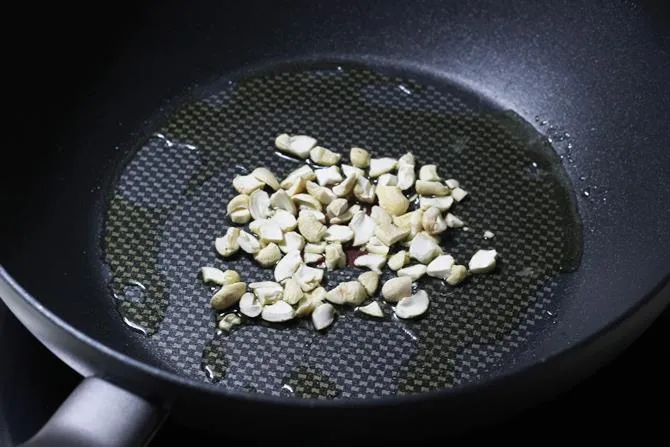 frying nuts in ghee to make pumpkin halwa