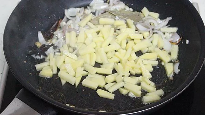 roasting aloo until cooked 