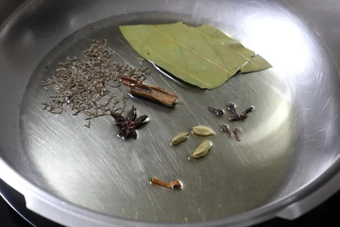 fry spices in oil