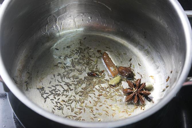 sauteing spices in oil for mushroom biryani recipe