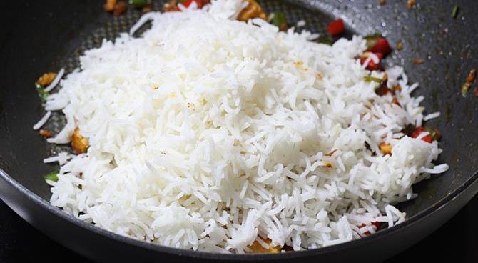 addition of rice in schezwan chicken fried rice recipe