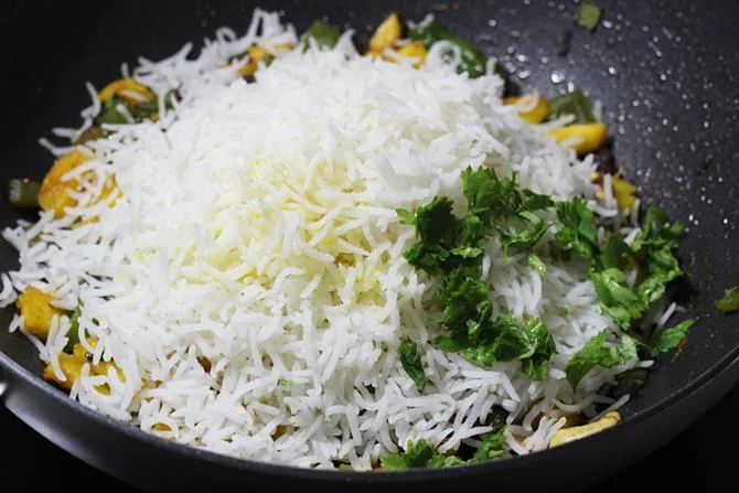 addition of rice for thai veg pineapple fried rice recipe