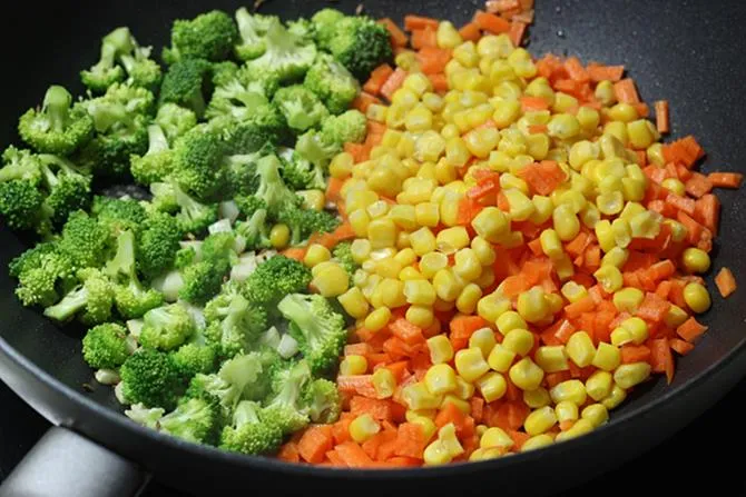 addition of chopped veggies to make broccoli recipe 02