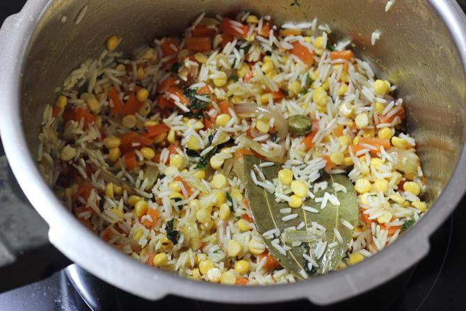 addition of rice to make chana dal rice