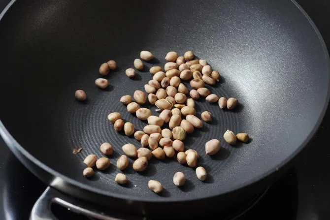 roasting peanuts in skillet for mirchi ka salan recipe