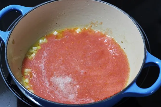 add the tomato puree