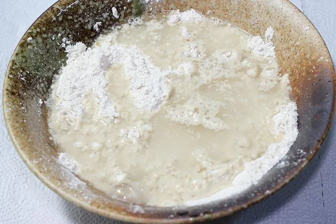 pour water to make dough