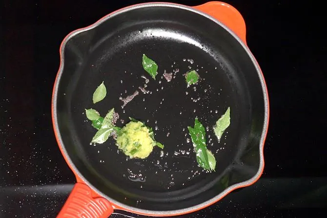 frying ginger to make batata vada stuffing