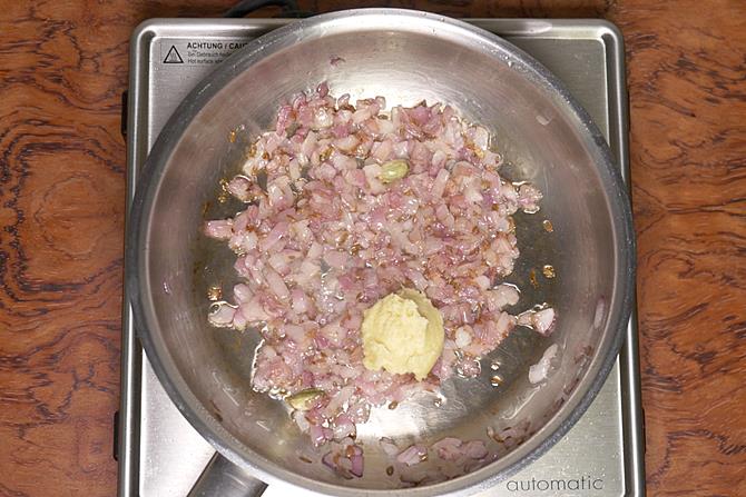 adding ginger garlic paste to make paneer do pyaza