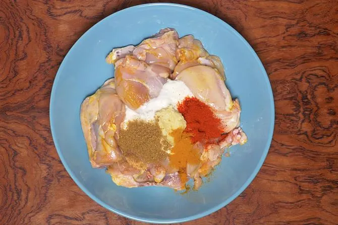 coat the chicken with spices and salt