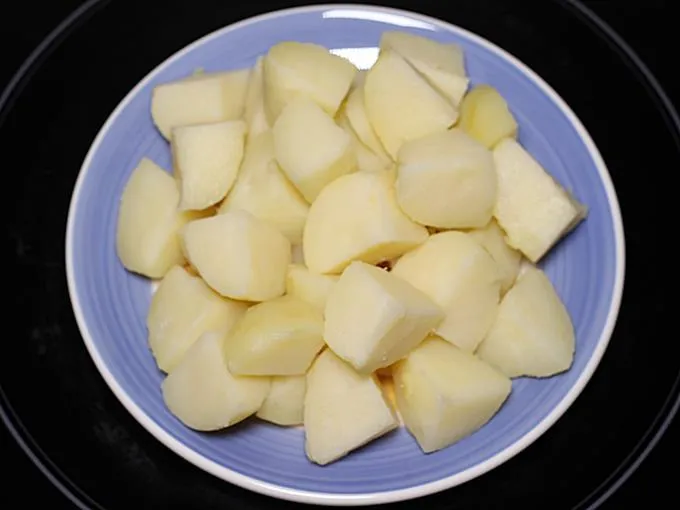 cube potatoes to make jeera aloo