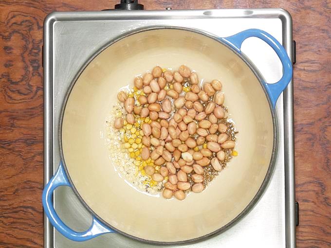 add in urad dal, chana dal and peanuts