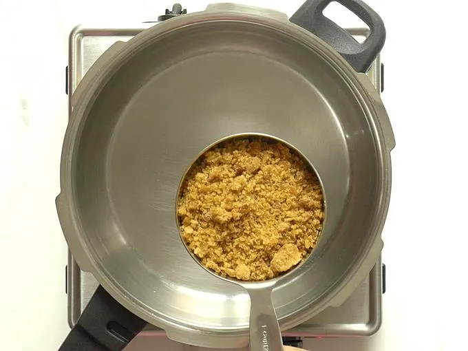 grate jaggery for syrup to make chikki recipe