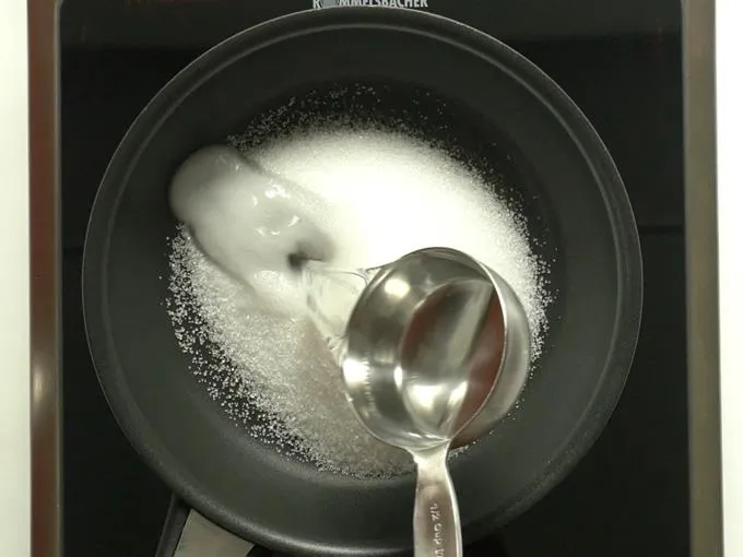 pour water to make sugar syrup for kaju katli recipe