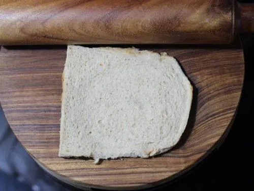 rolling bread to a sheet 