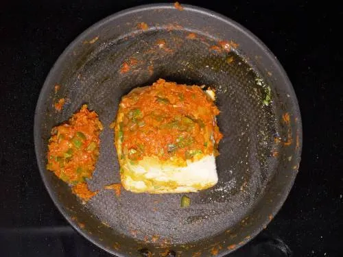masala topped on toasted pav