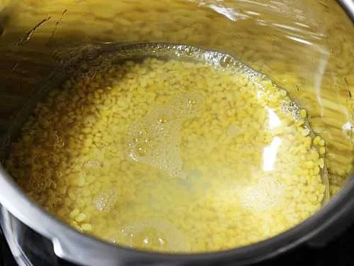 cooking moong dal in pot