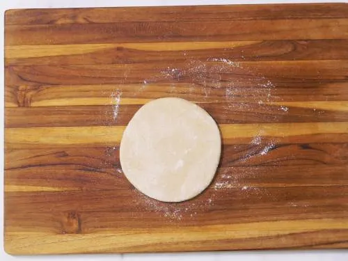 rolling dough to 4 inch discs