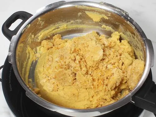 adding jaggery to make puran