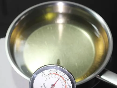 heat oil in a heavy bottom pan