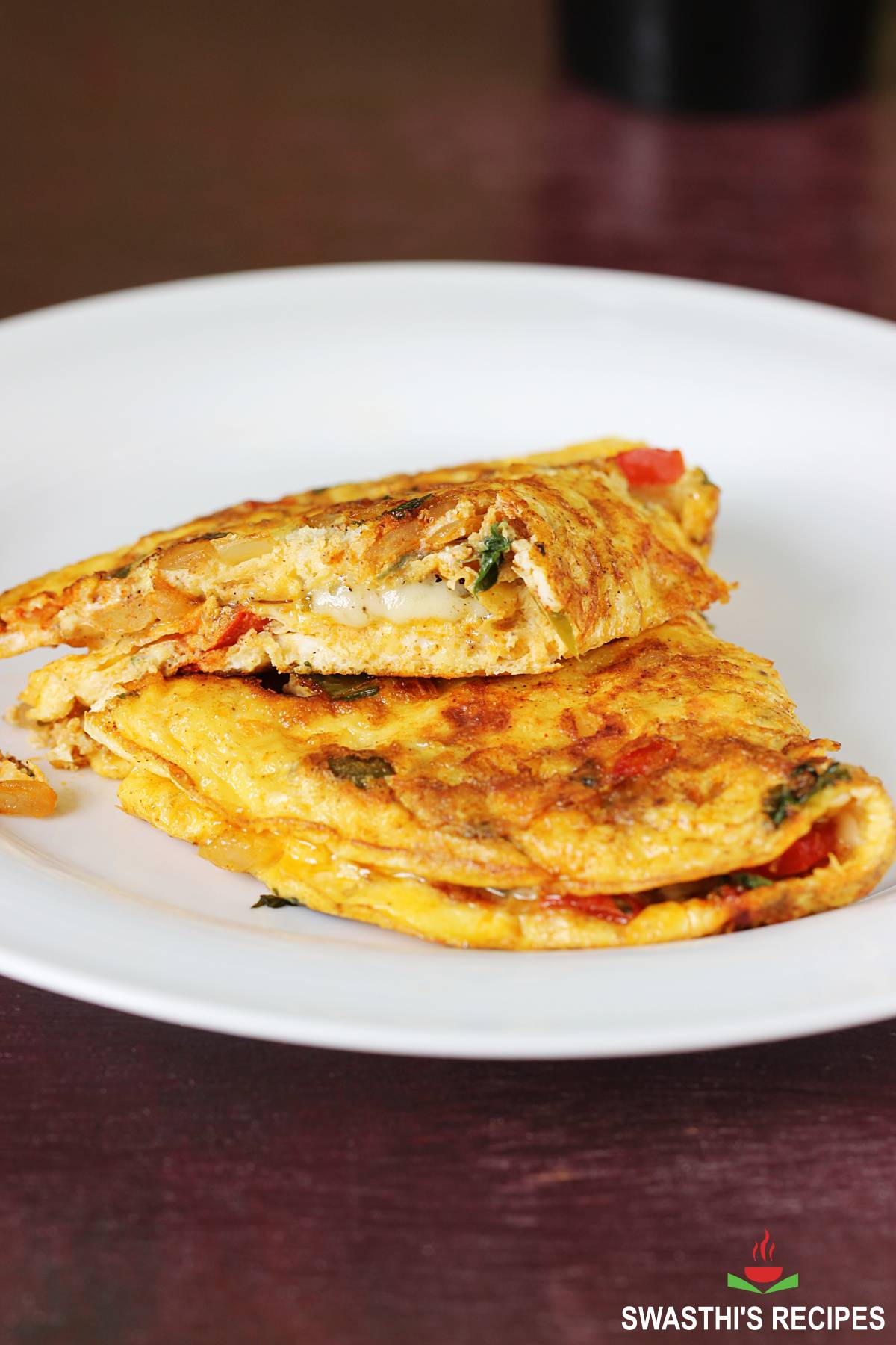 https://www.indianhealthyrecipes.com/wp-content/uploads/2021/06/cheese-omelette.jpg