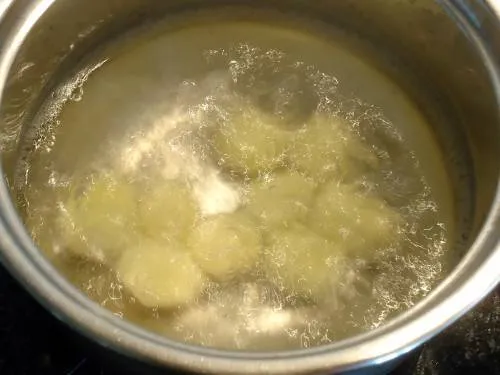 boiling aloo to make dum aloo