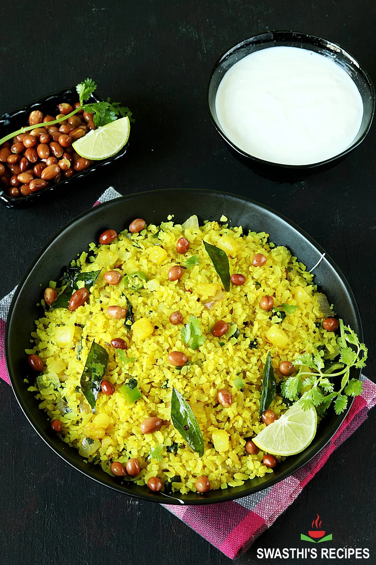 poha recipe made with flattened rice, spices and herbs