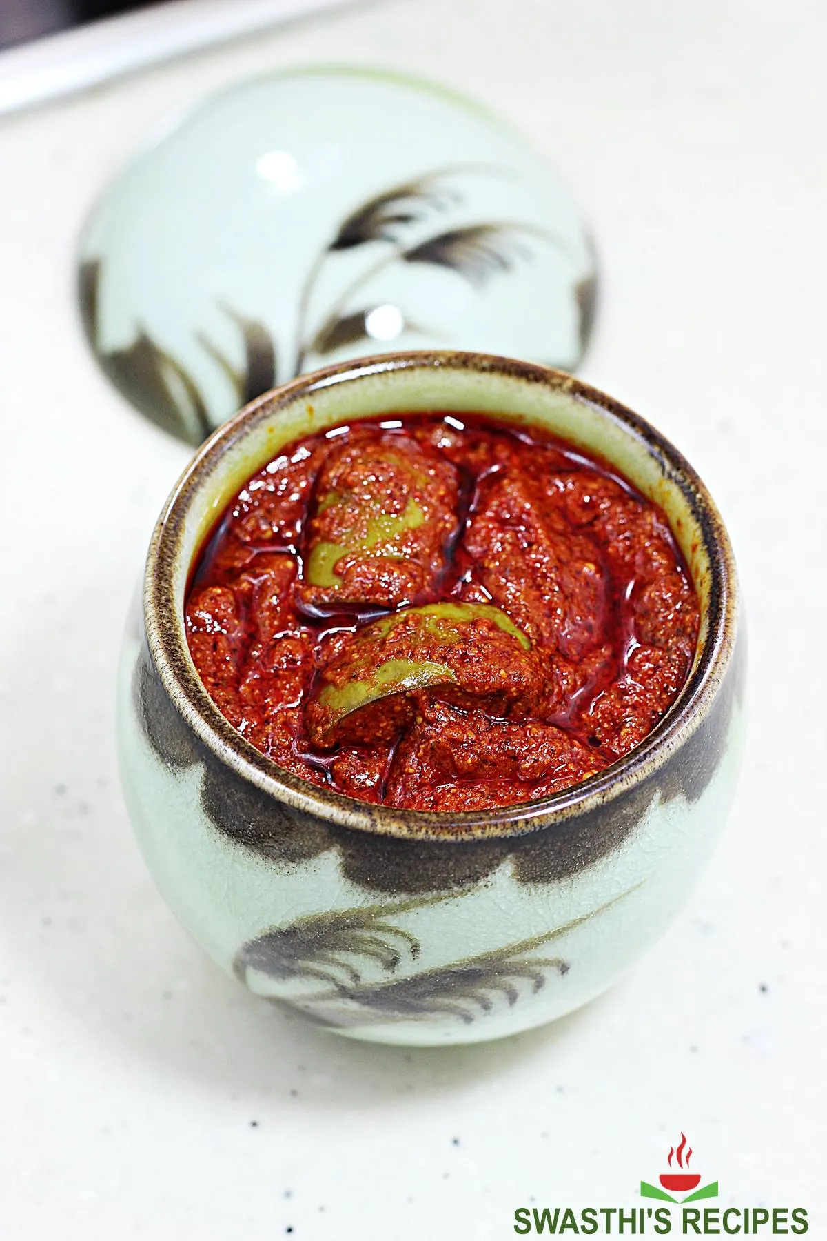 mango pickle recipe made with unripe raw green mangoes