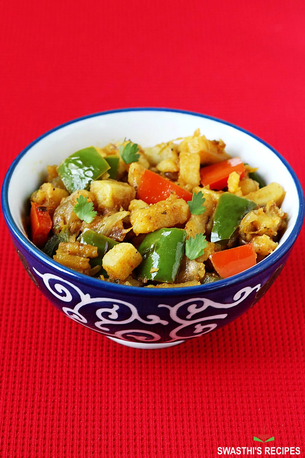 Aloo Capsicum made with potato, bell peppers and spices