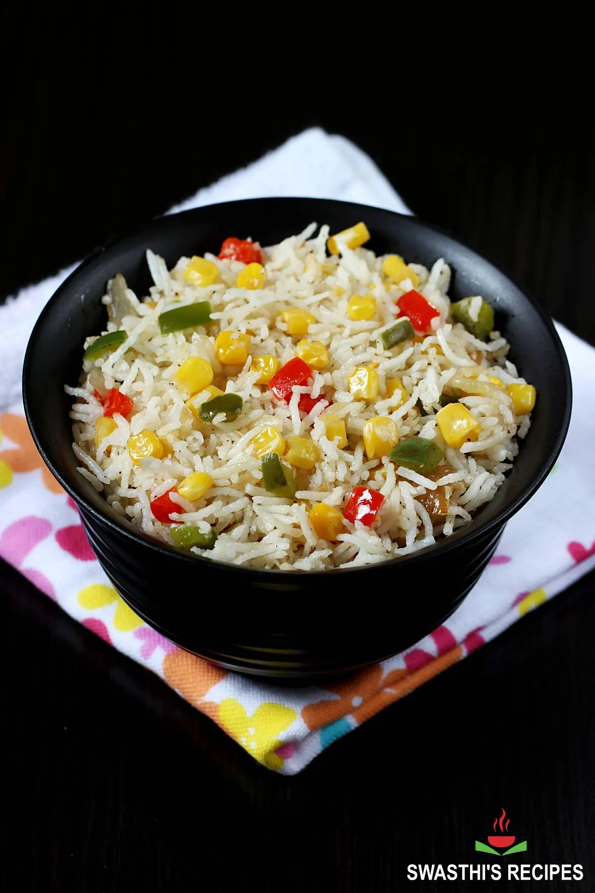 Corn fried rice made with precooked rice and corn kernels