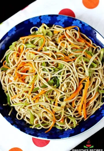 Veg noodles aka vegetable noodles served in a blue bowl