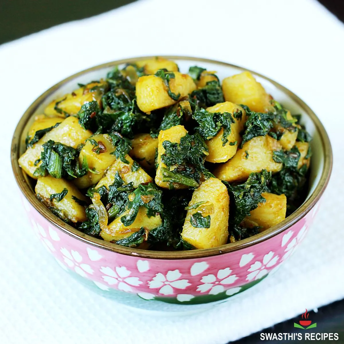 Aloo palak is spinach potatoes made in Indian style