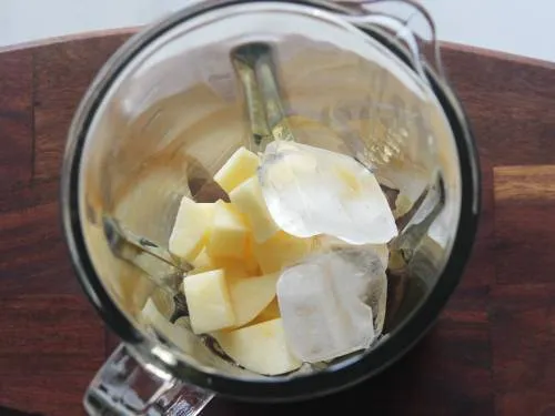 chopped apples in a blender