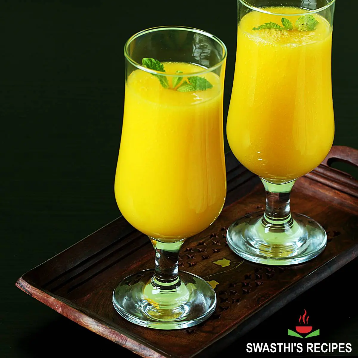 https://www.indianhealthyrecipes.com/wp-content/uploads/2022/05/mango-juice-recipe.jpg.webp