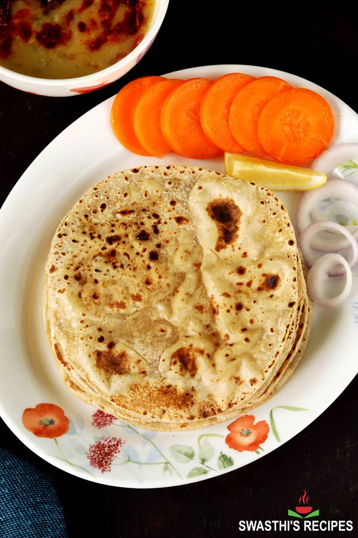 Indian iron tawa or pan to prepare chapati, roti on white