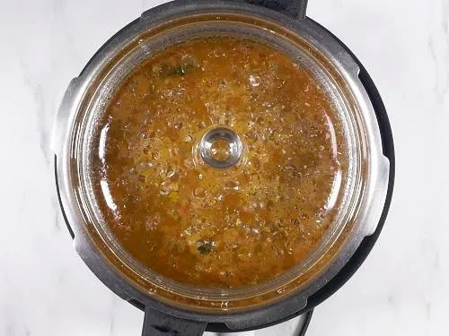 simmering green moong dal