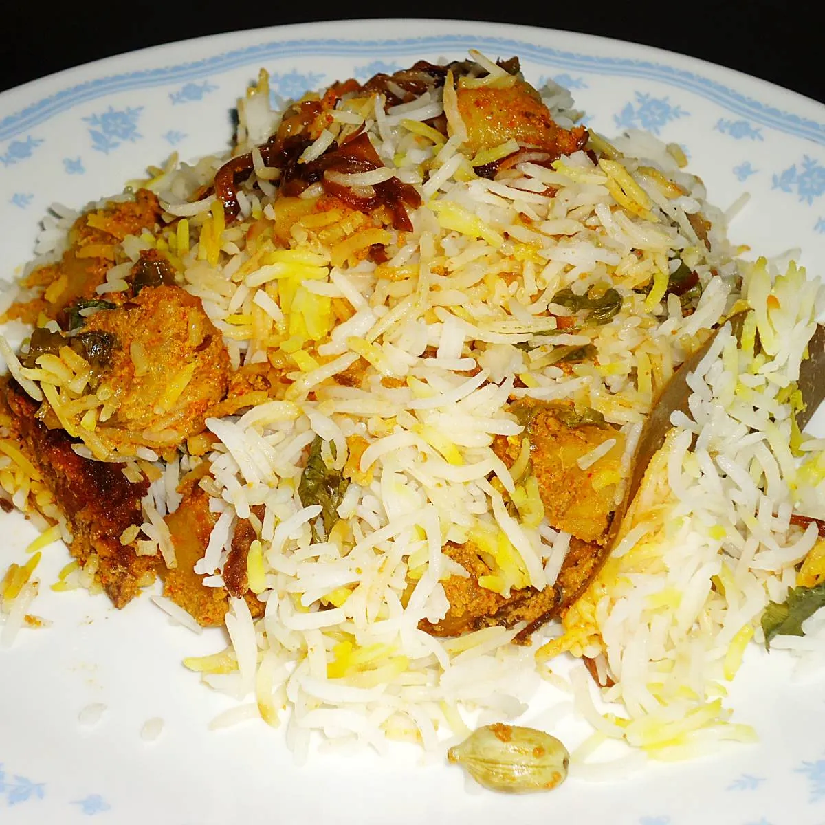 dum aloo biryani in a plate