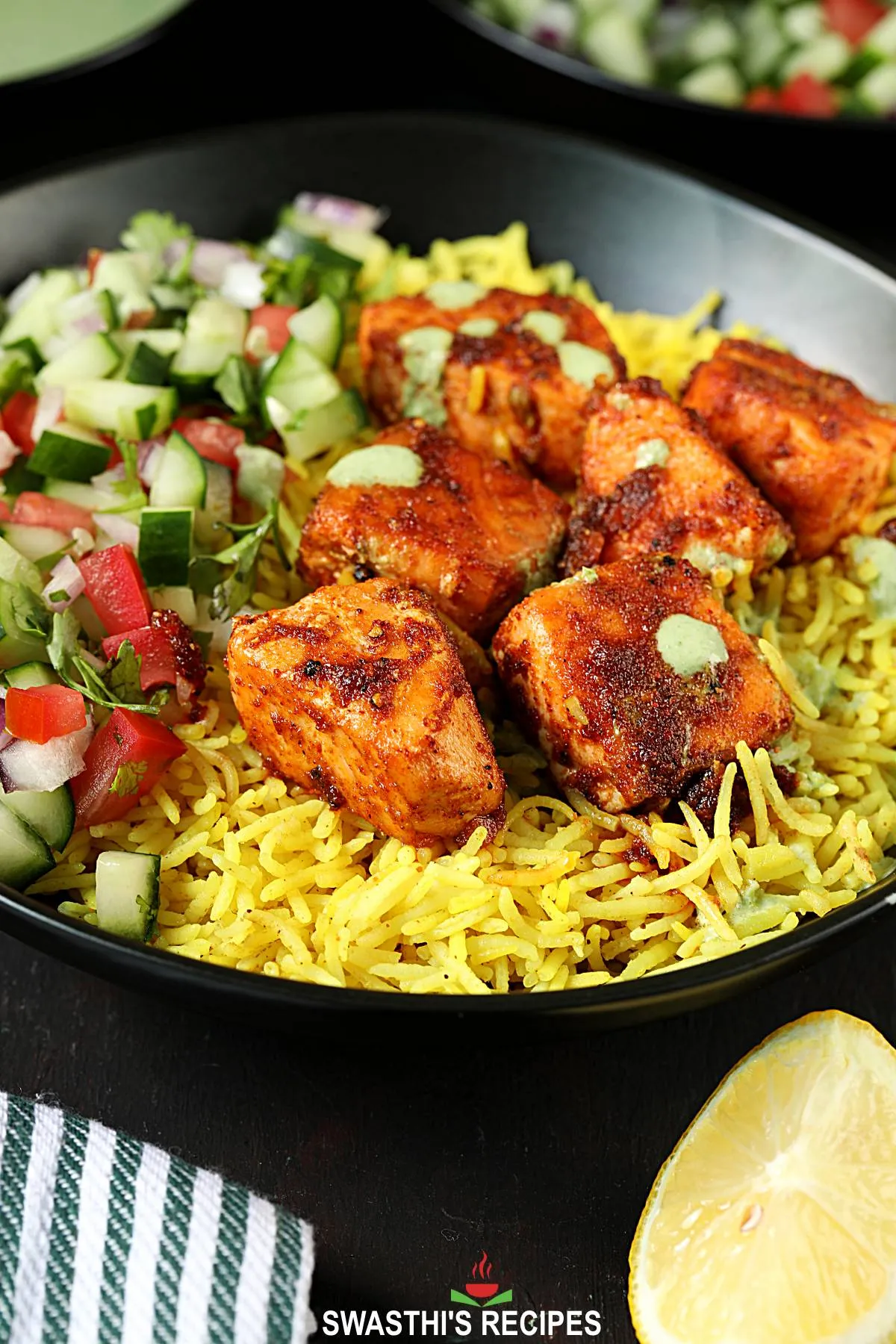 salmon bowl with rice, salad and raita