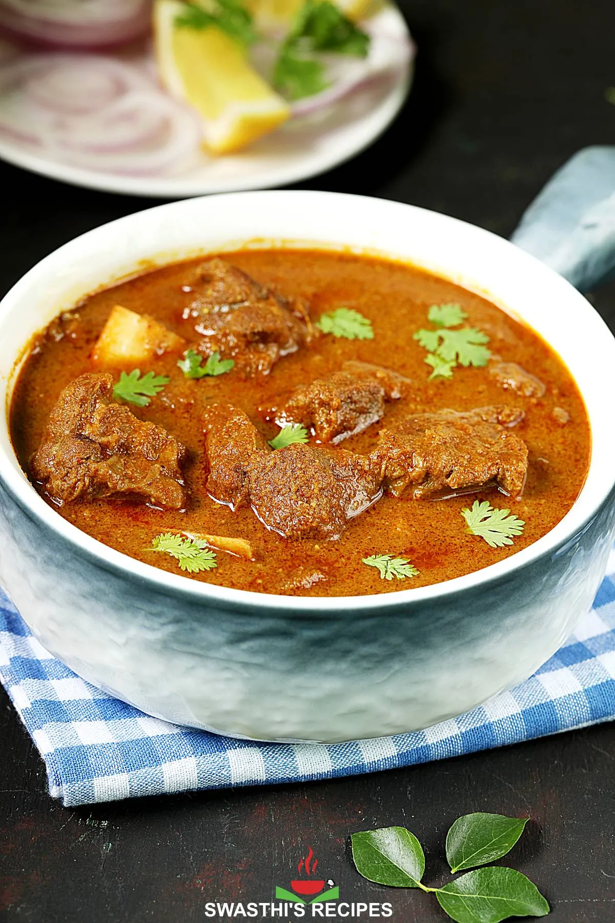 Chettinad Curried Goat in a white bowl