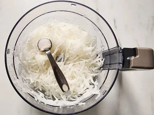 salt and grated radish to make parathas