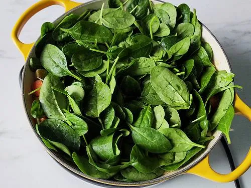 saute saag in a pan