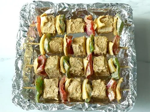 tofu tikka skewers in a tray