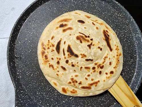 flaky parotta for chicken roll