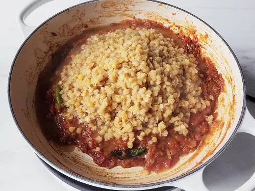 stir in the red lentils into the curry base