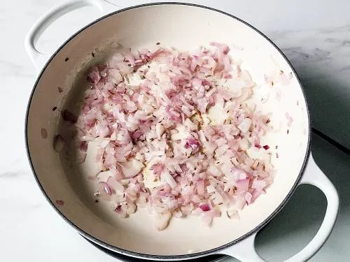 golden sauteed onions in a pan